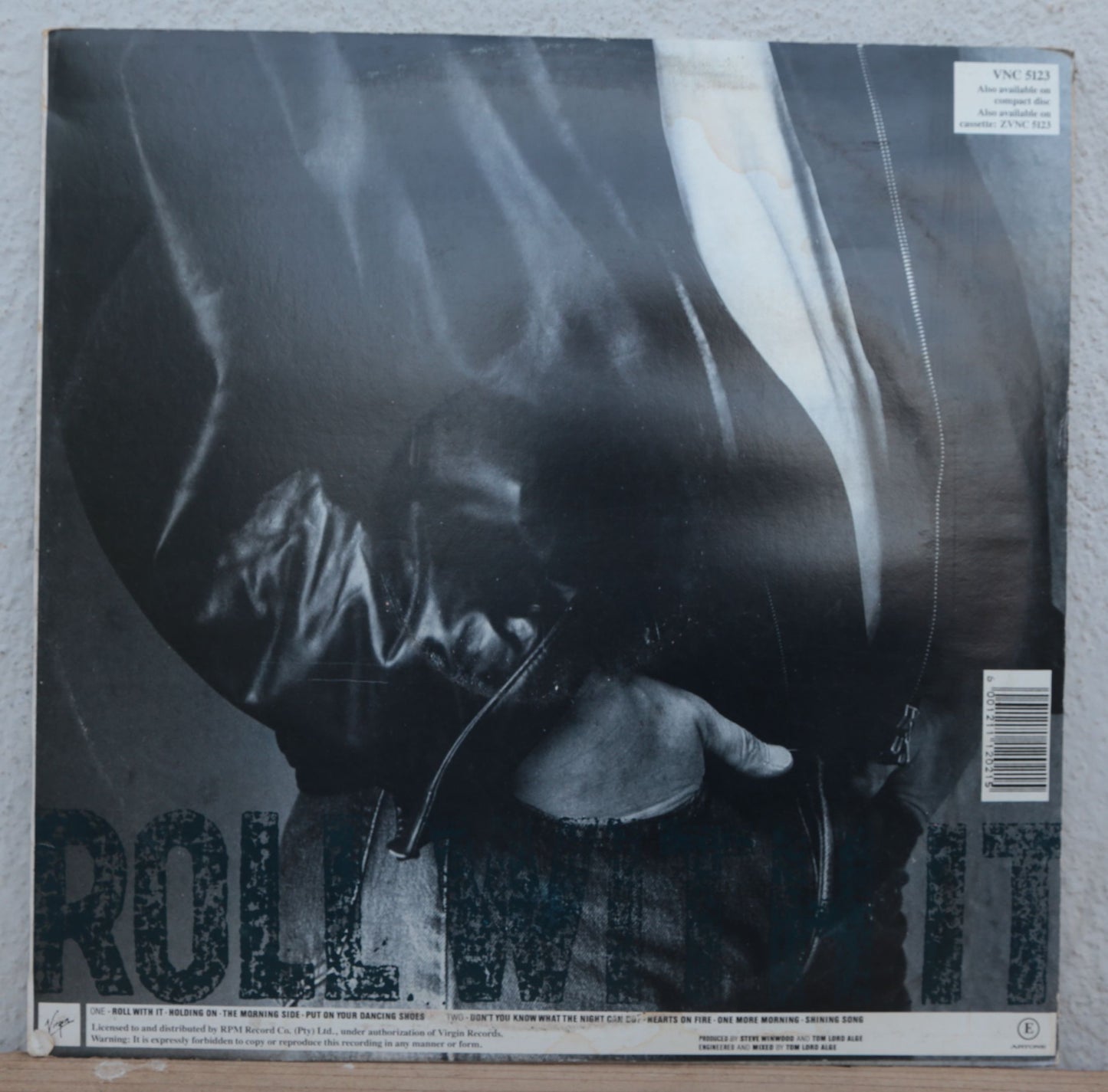 Steve Winwood - Roll with it