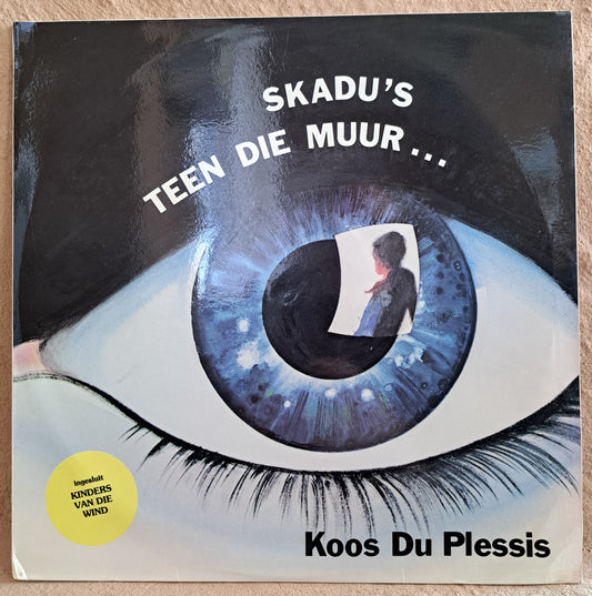 Koos Du Plessis - Skadu's teen die muur...